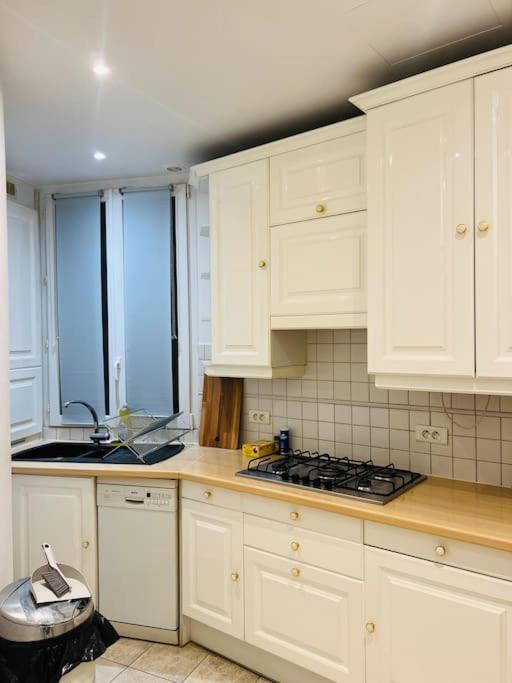 Au Pied De La Tour Eiffel Apartment Paris Exterior photo